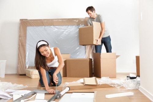 Furniture being loaded into a removals vehicle during a Brompton house move