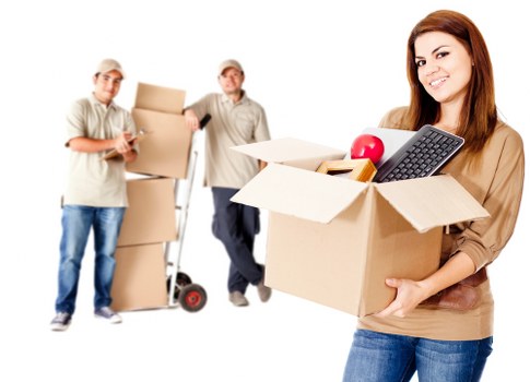 Careful packing and wrapping of household items for a move in Brompton