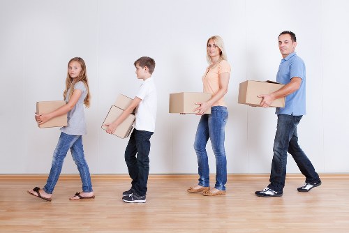 Business equipment and office furniture being delivered to a new premises