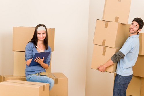 Protective wrapping and safe loading for a piano move in a Brompton property